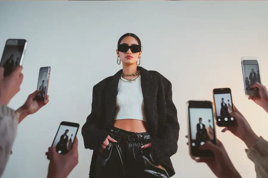 Chic woman modeling fashion for Asmone featuring trendy urban streetwear and accessories.